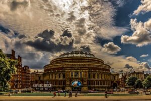 The Royal Albert Hall in London under a cloudy sky